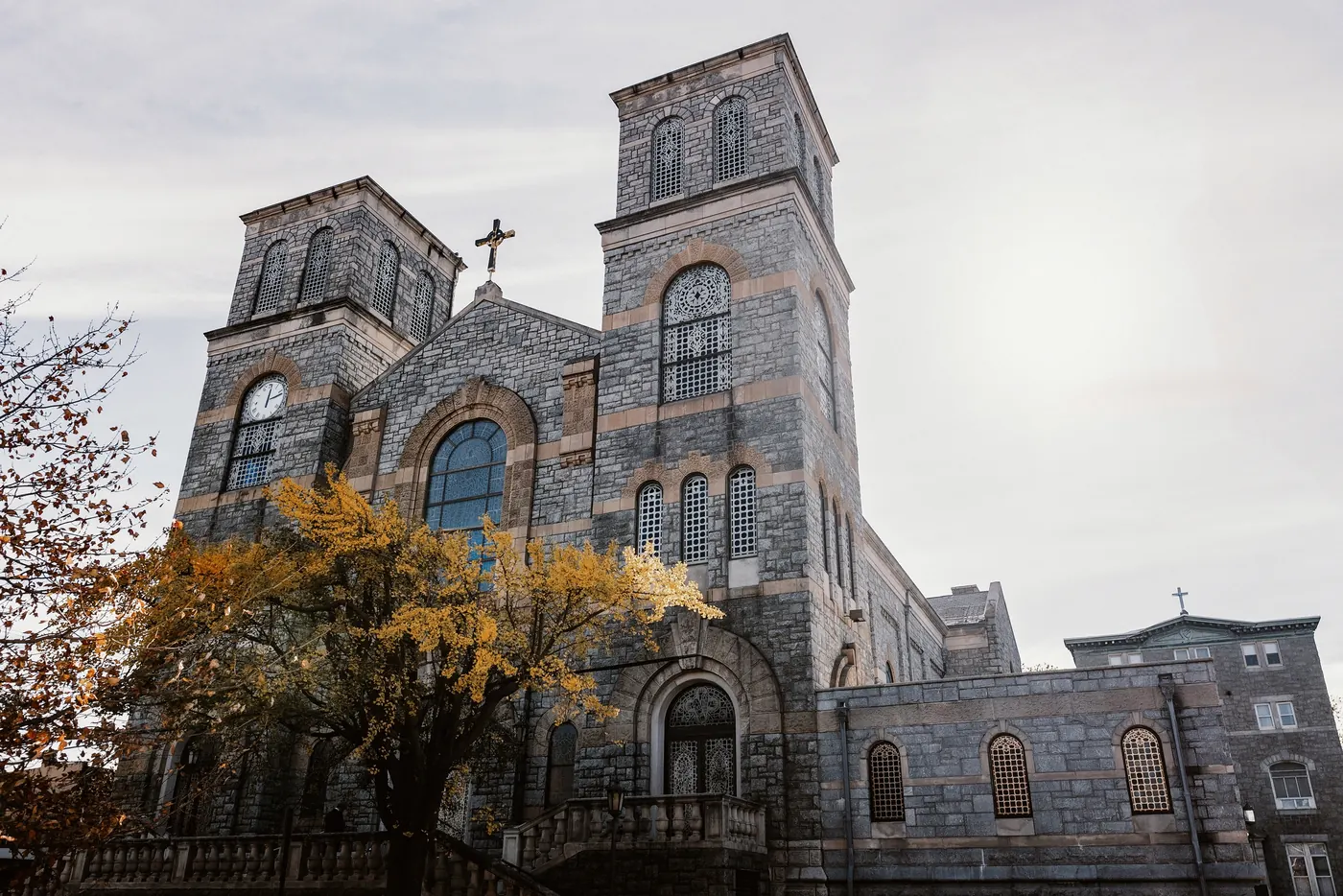 The stone towers of Saint Monica Roman Catholic Church in South Philadelphia, where Branon and Celeste were married