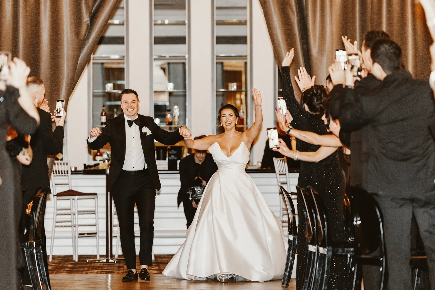 Branon and Celeste making their grand entrance at The Vie by Cescaphe in Philadelphia