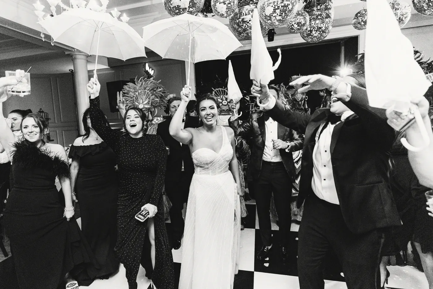 Black and white photo of the dance floor full of umbrellas at The Vie by Cescaphe in Philadelphia