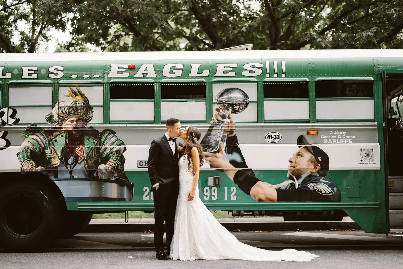 Chris and Danielle kissing in front of a Philadelphia Eagles party bus