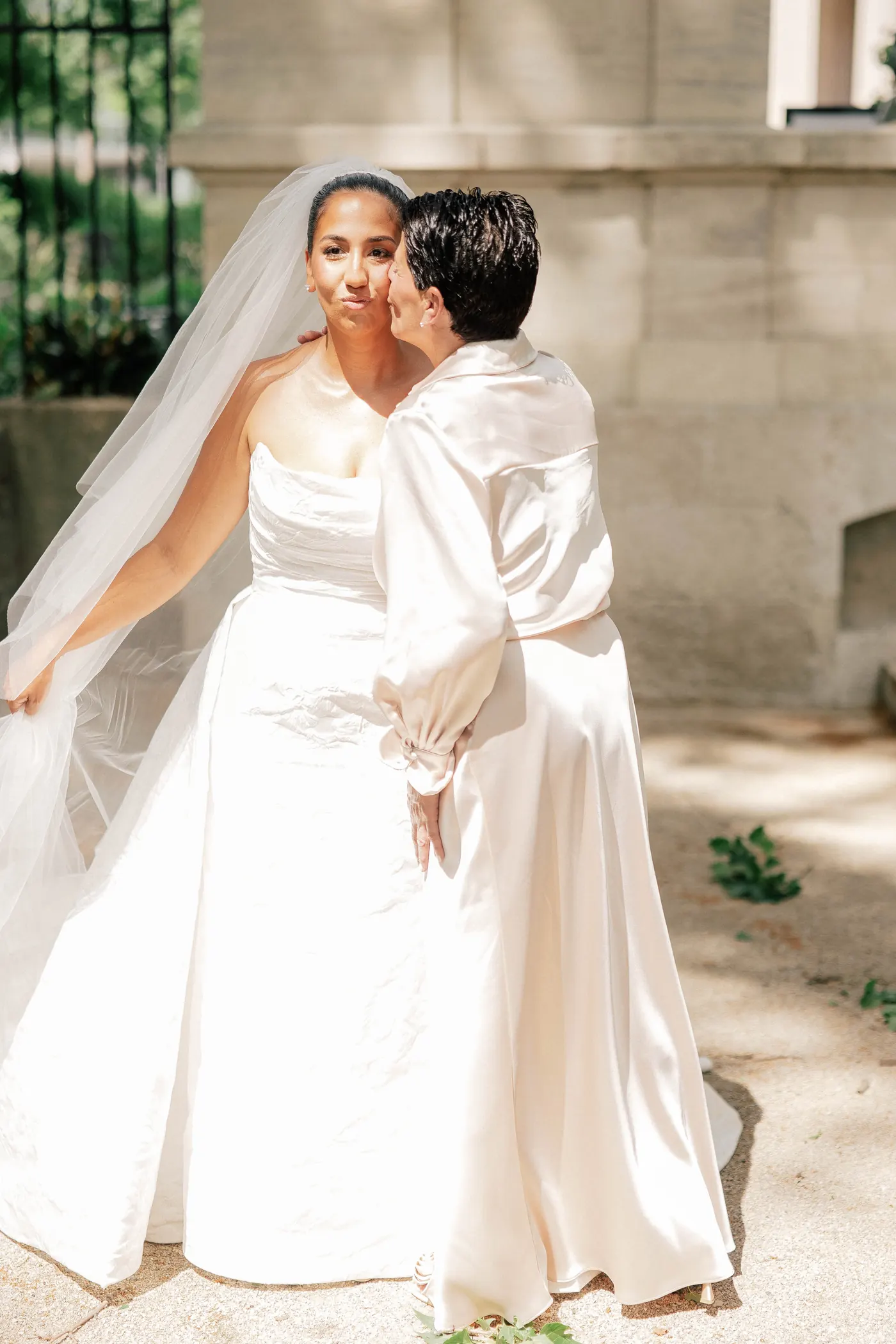 Gianna and her mom cheek to cheek before the first look at the Rodin Museum