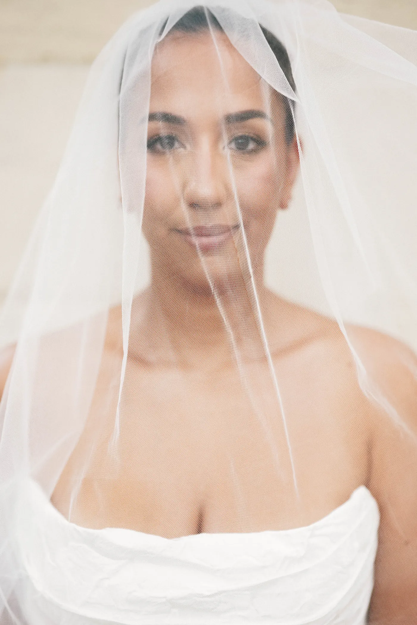 Gianna looking into the camera through her veil
