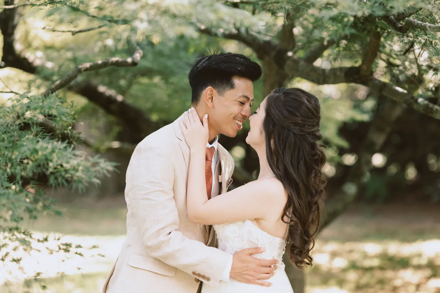 Ivan and Camille nose to nose under the trees