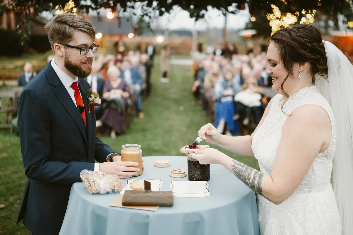 Jimmy and Kelsey making a peanut butter and jelly sandwich together as their unity ceremony