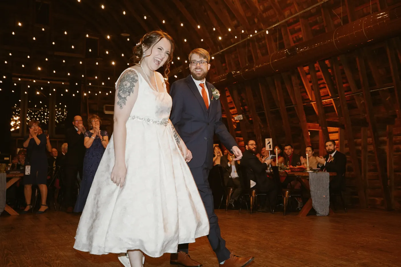 Jimmy and Kelsey making their grand entrance into the barn at Bishop Farmstead