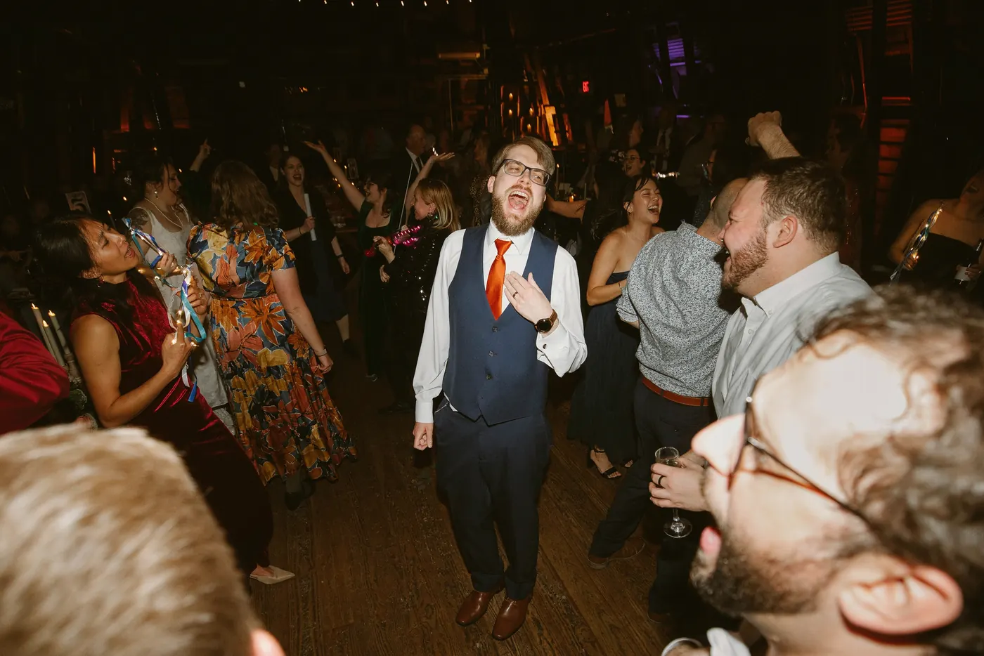 Jimmy laughing on the crowded dance floor