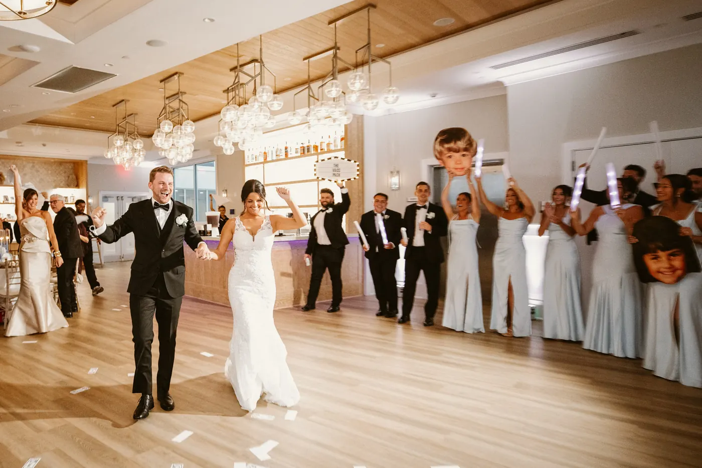 Mason and Morgan making their grand entrance into the reception at ICONA Diamond Beach