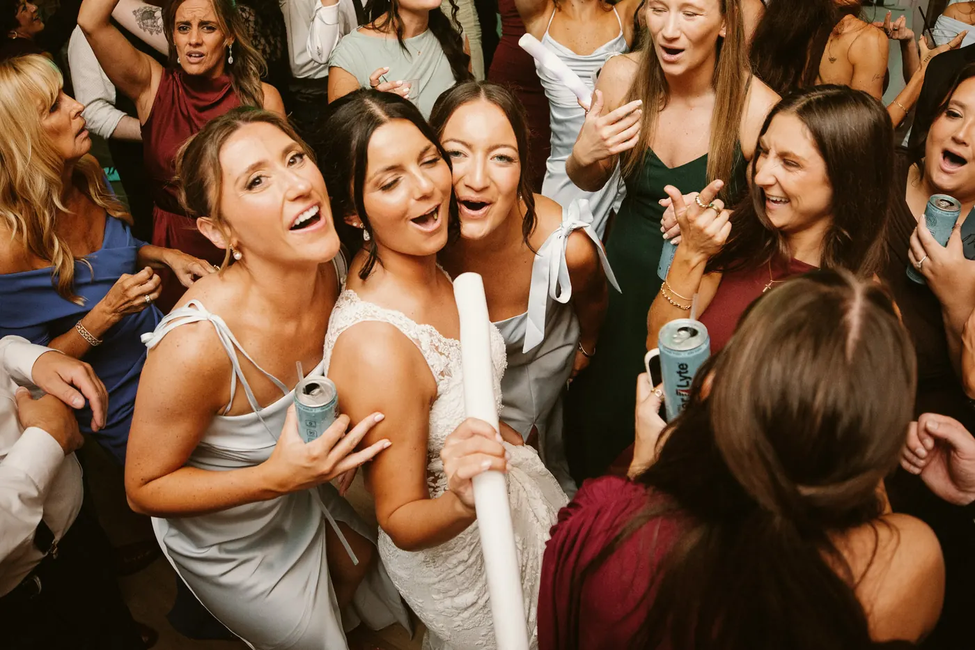 Morgan and her friends singing together on the dance floor